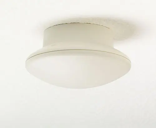 Base level spacer for ceiling/wall mounting