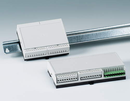 Low profile DIN rail enclosures